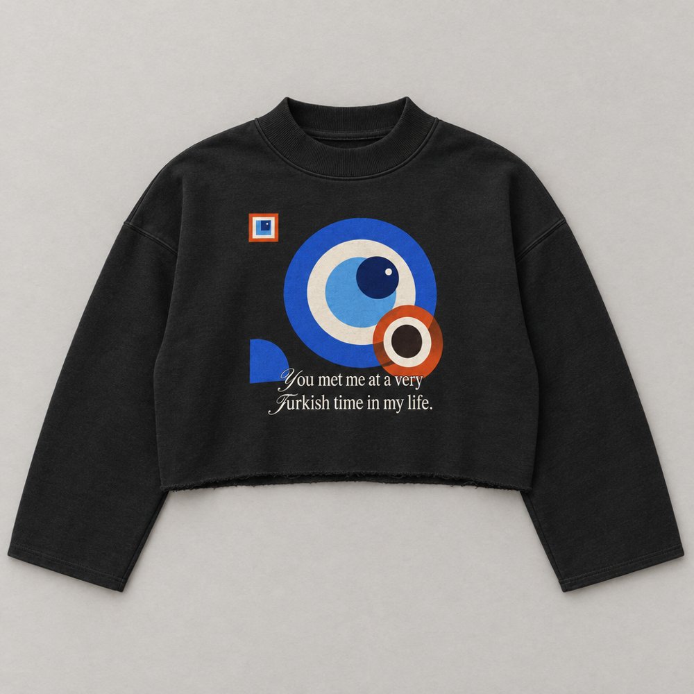 Black boxy 480inc sweatshirt with Bauhaus nazar print and the line you met me at a very Turkish time in my life
